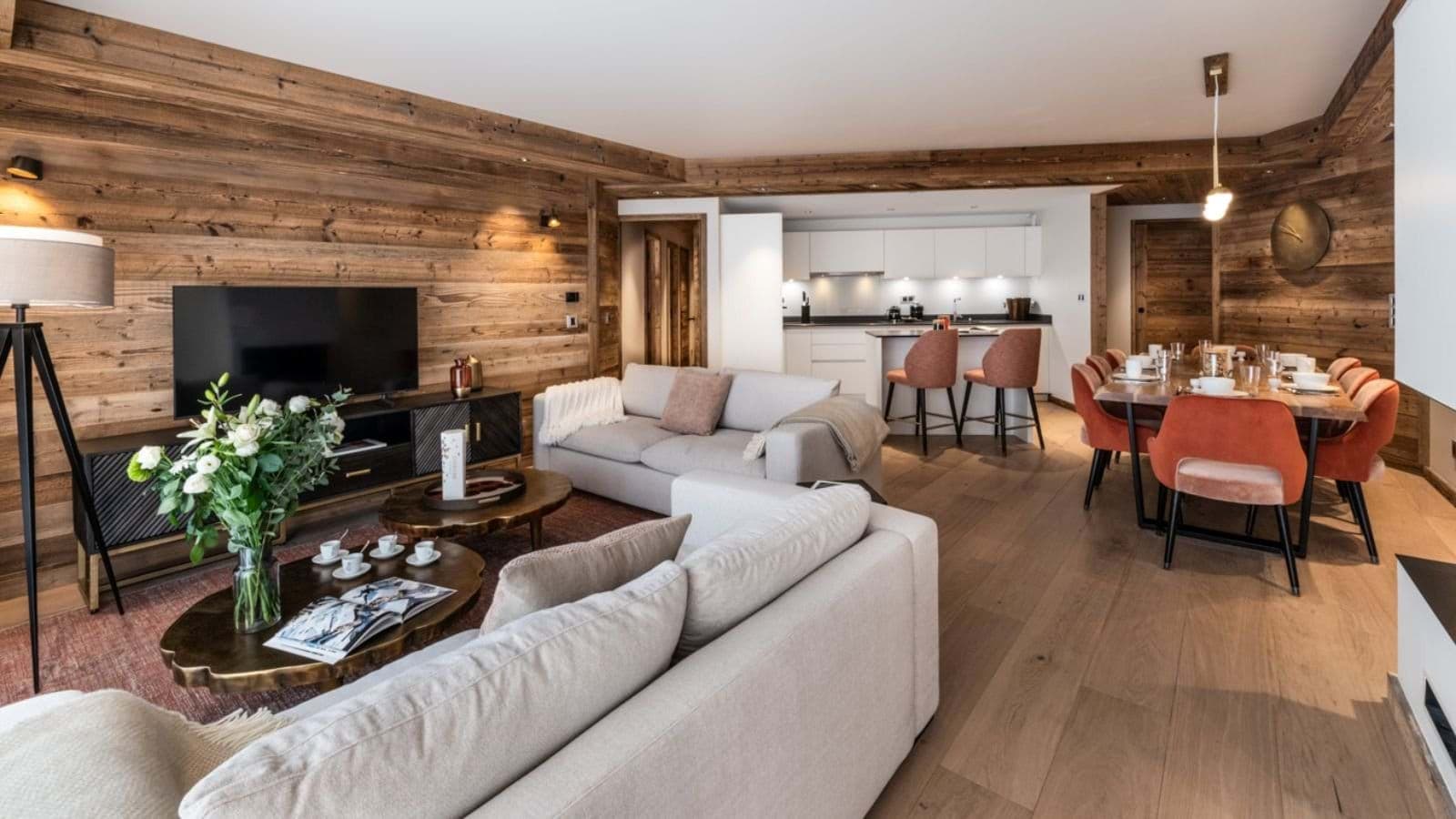 Open-plan living area; dining table seats 8 and breakfast bar seats 2