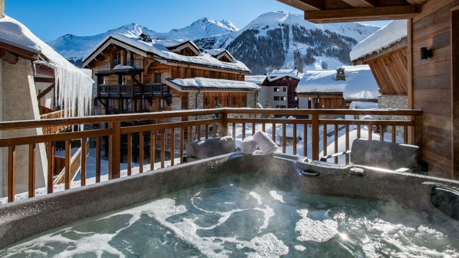 Private balcony hot tub with views of the Espace Killy ski slopes