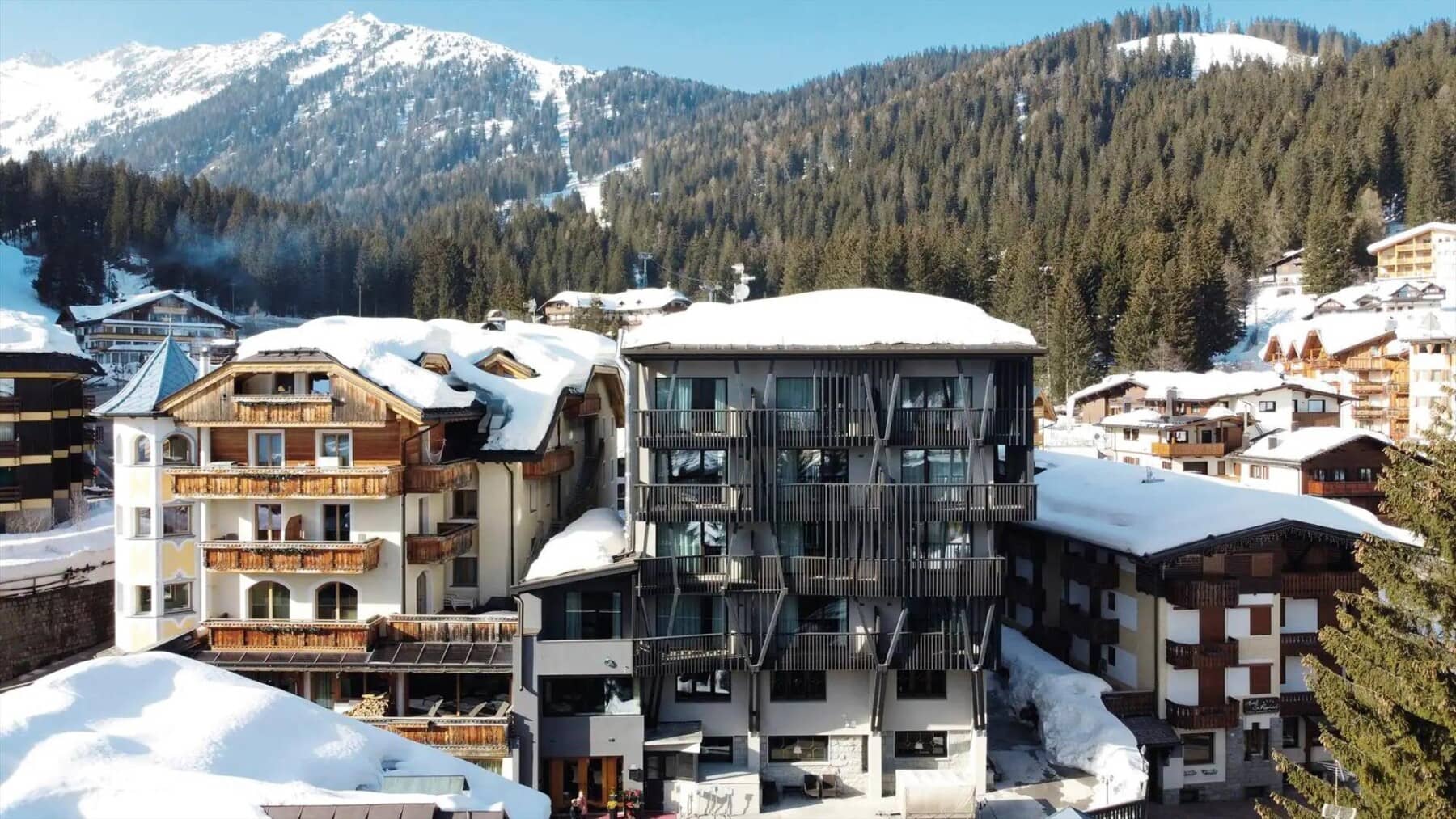 Ski-in/ski-out chalet with private balconies and direct mountain access