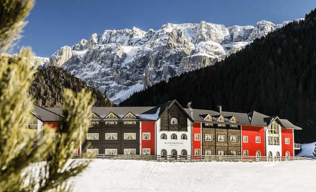 Ski-in lodge exterior with direct access to Dolomite mountain trails
