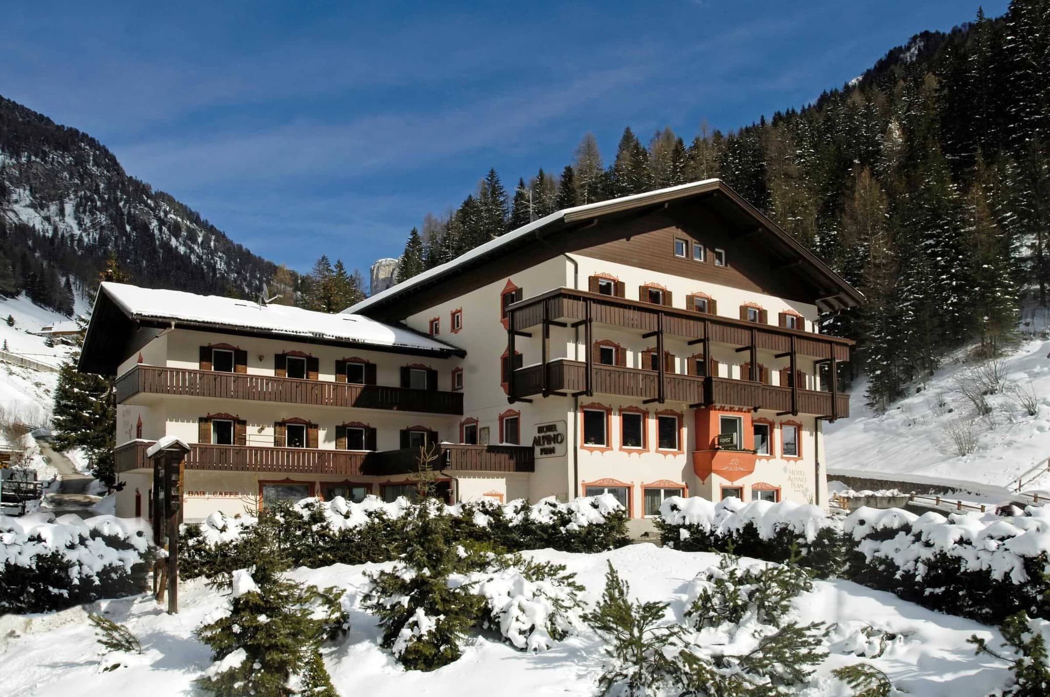 Chalet exterior with private balconies and mountain views