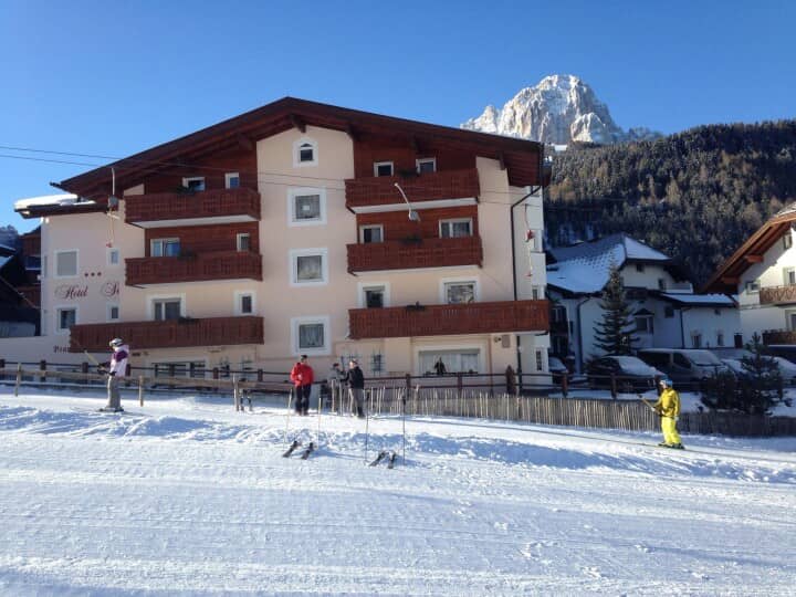 Ski-in/ski-out chalet exterior located directly on the mountain slope