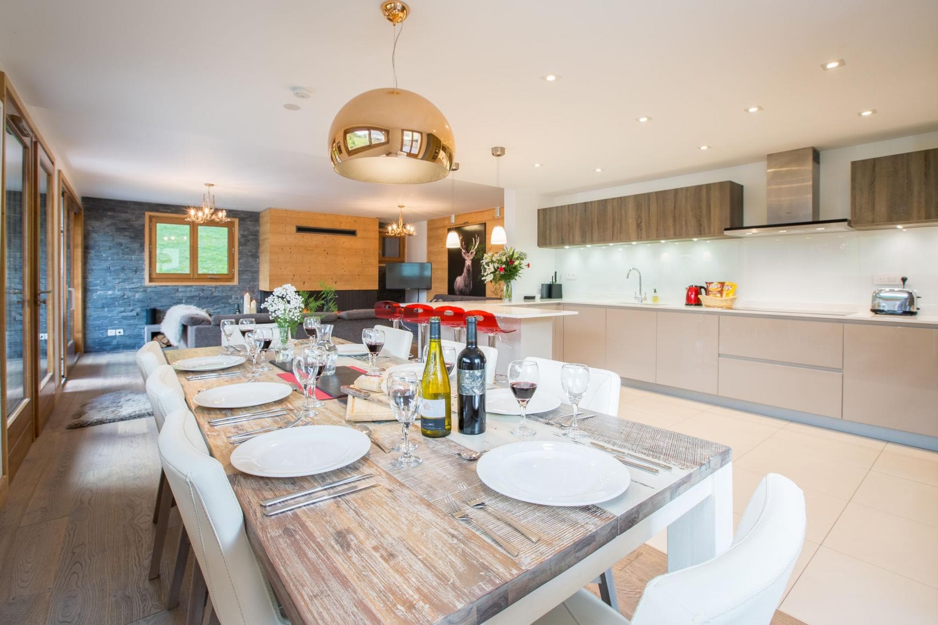 Open-plan dining area with seating for 8 and kitchen island