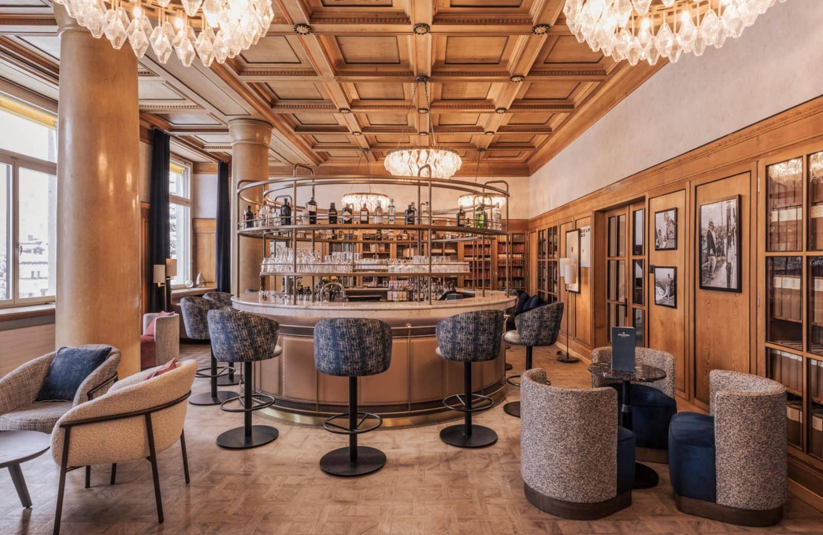 Library bar with circular seating and original coffered wood ceilings