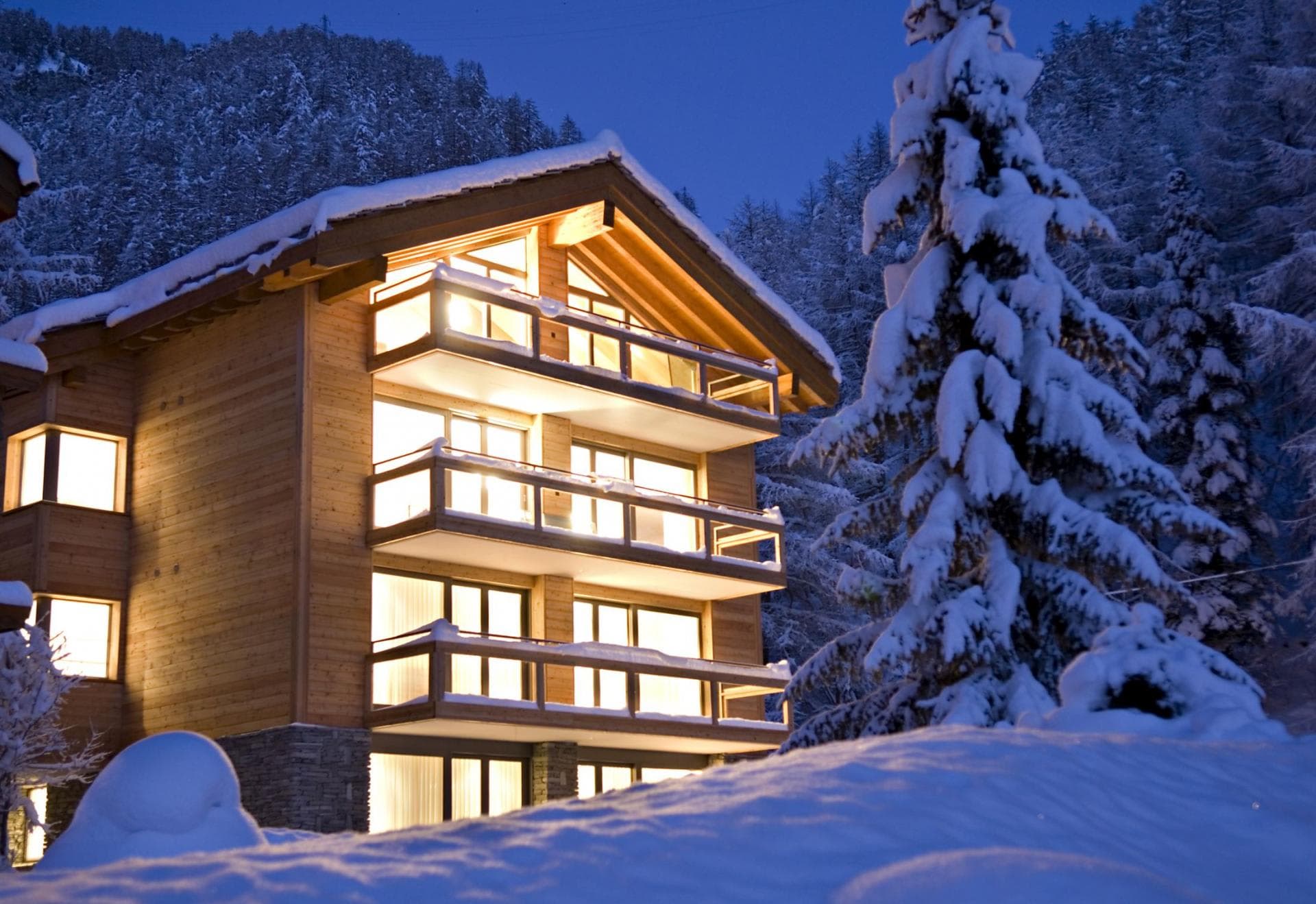Ski-in/ski-out chalet with private balconies overlooking the slopes