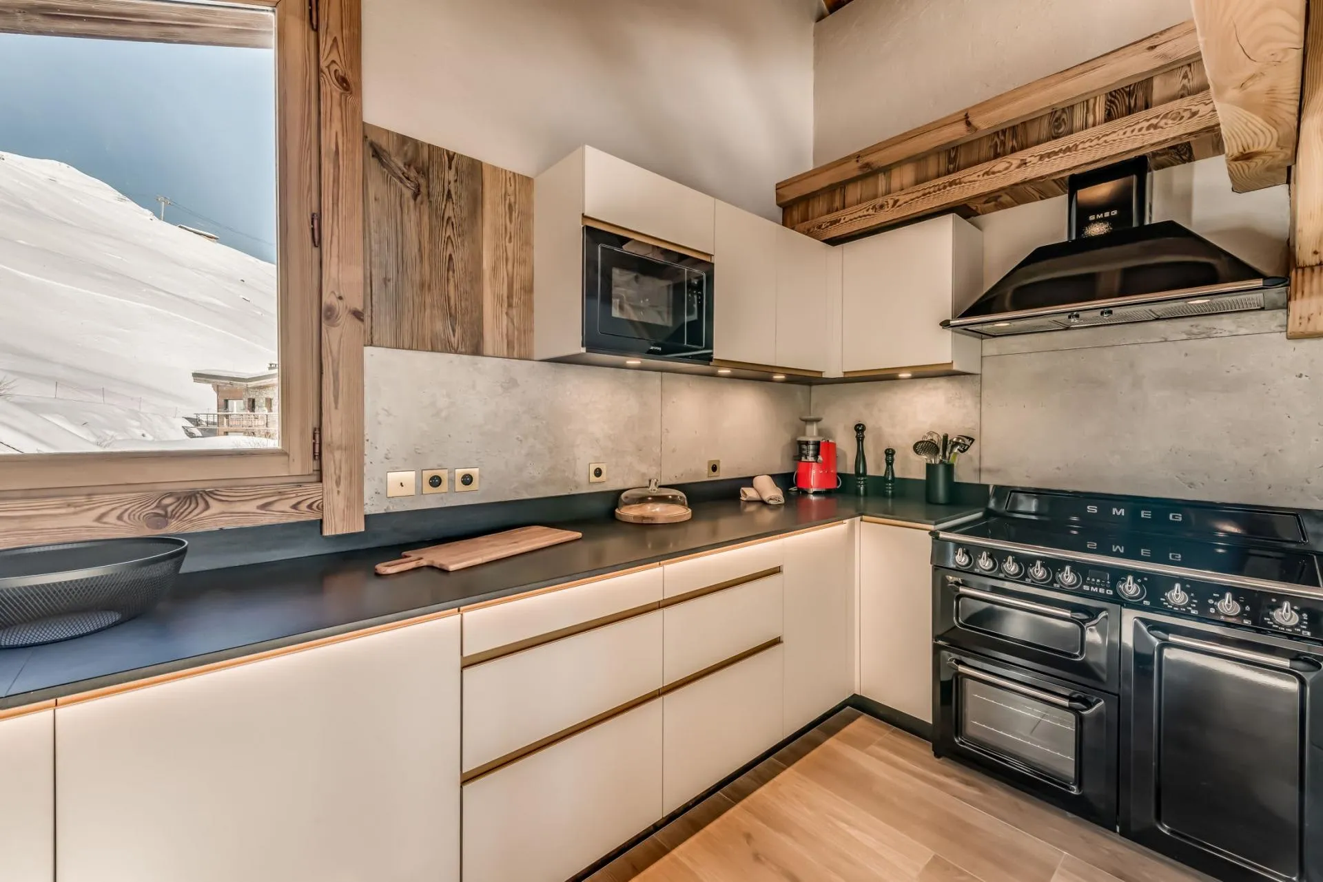 Kitchen with Smeg induction range and mountain views