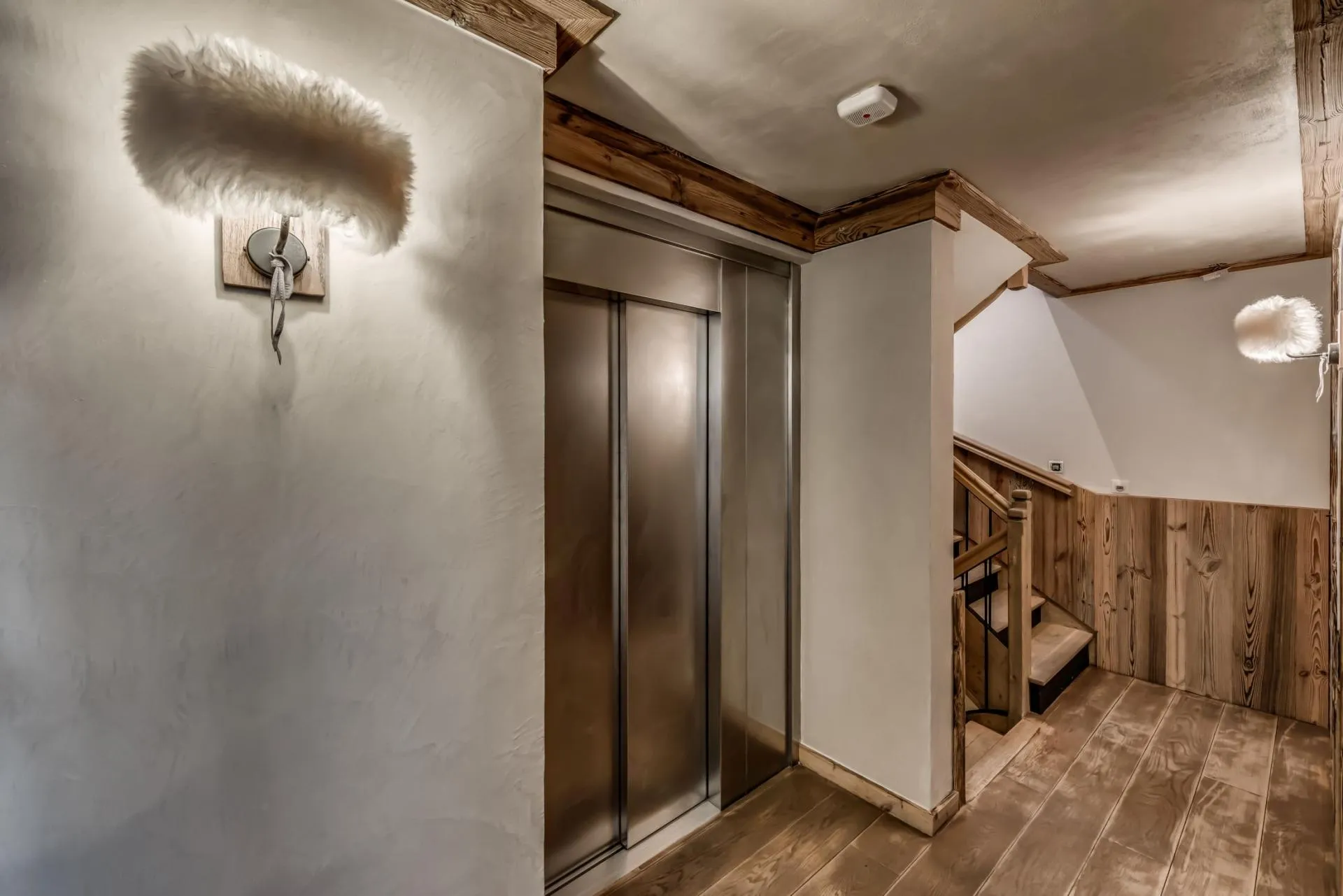 Private internal elevator provides access to all floors alongside stairs