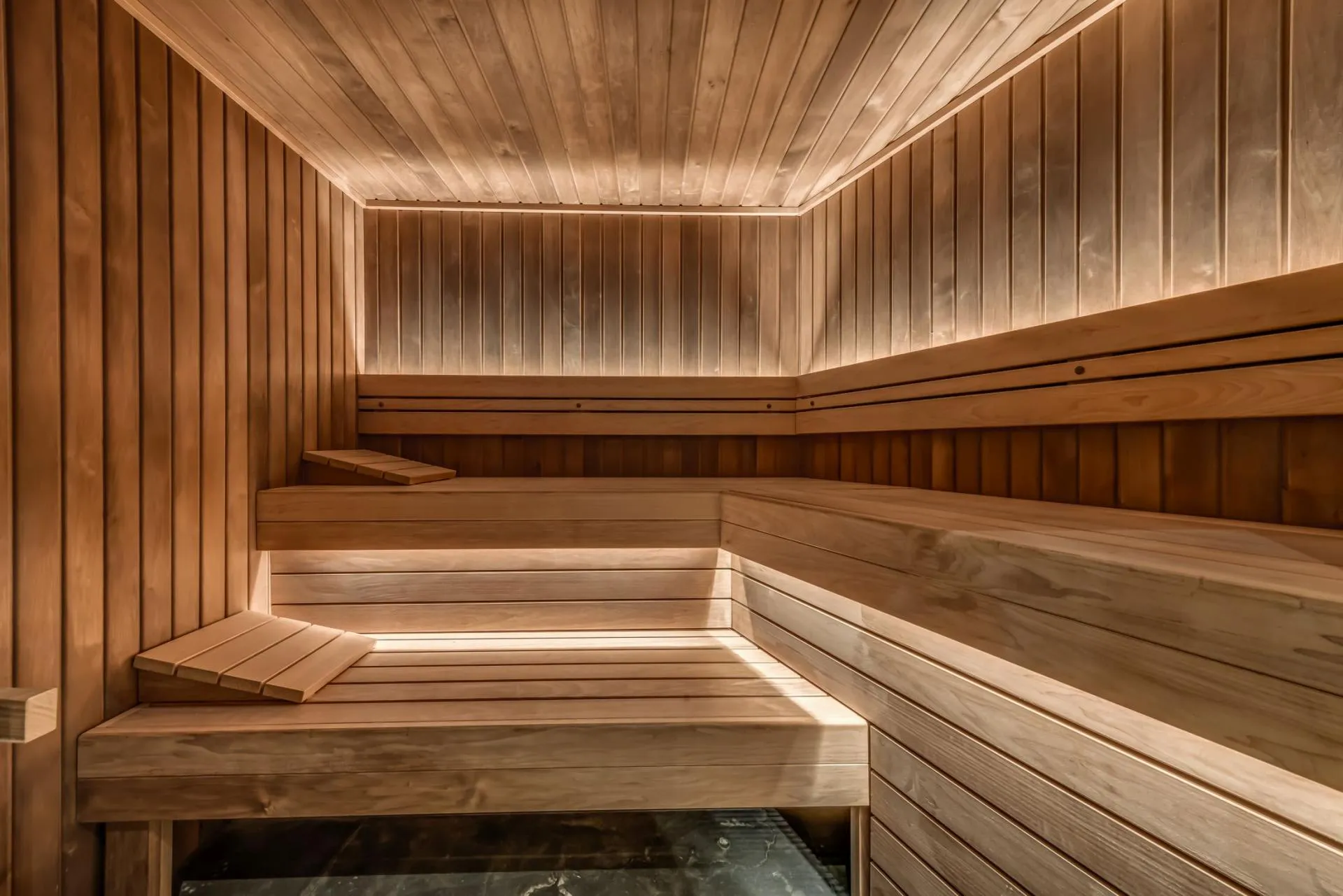 Cedar sauna with tiered seating for six and integrated LED lighting