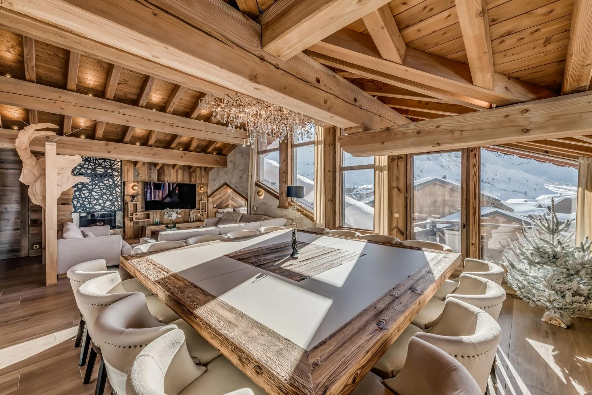 Open-plan dining area with seating for 12 and mountain views