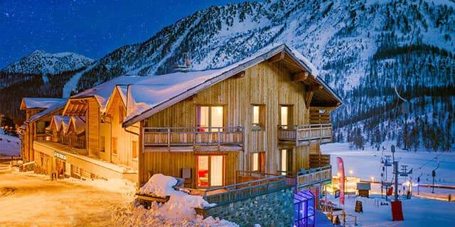 Ski-in/ski-out chalet exterior with immediate access to chairlifts and night skiing