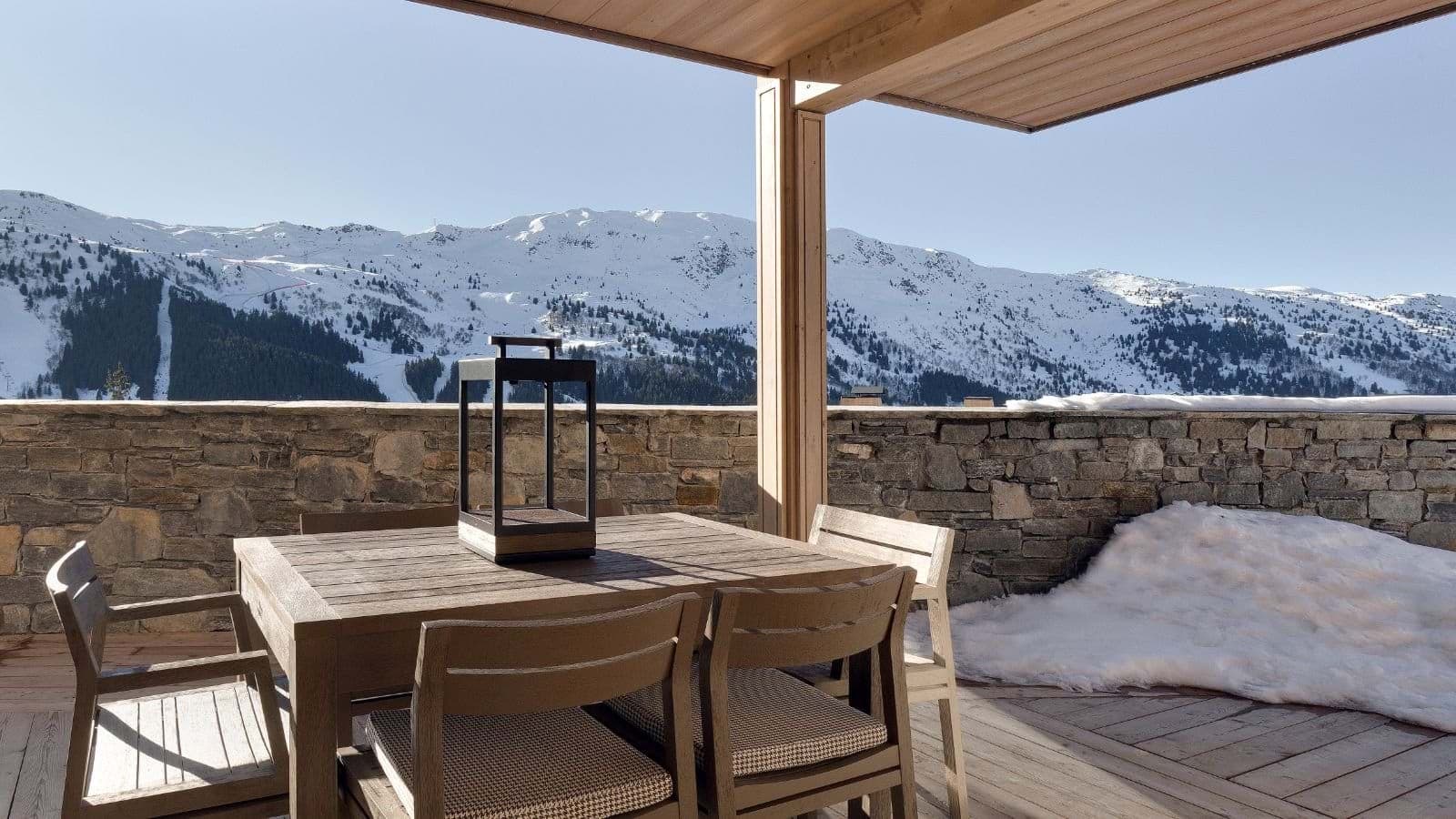 Covered terrace with dining for 4 and mountain views