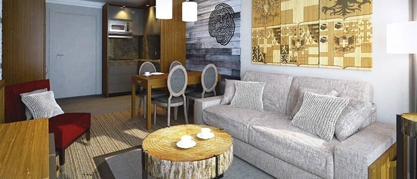 Open living area with sleeper sofa and dining seating for 4