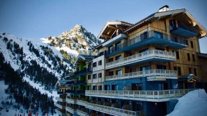 Ski-in/ski-out chalet with private balconies and mountain peak views