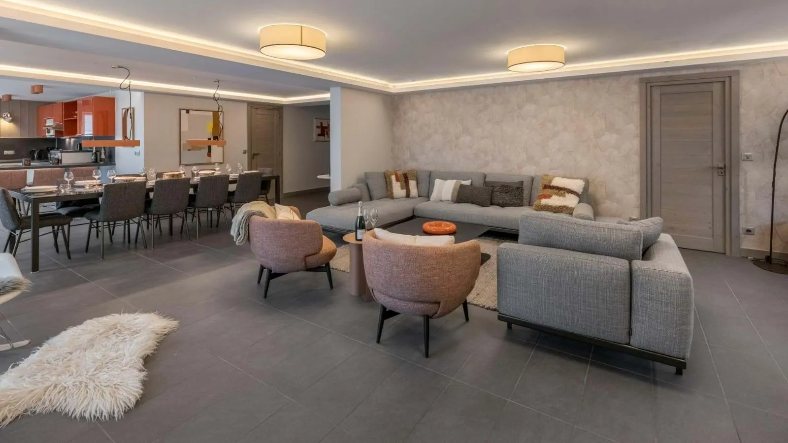 Open-plan living and dining area with seating for ten