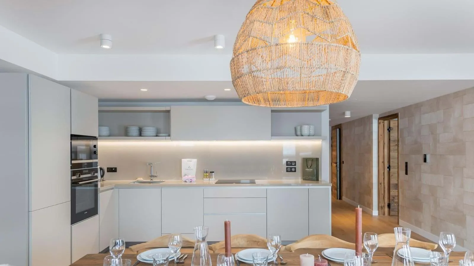 Fitted kitchen beside the dining table