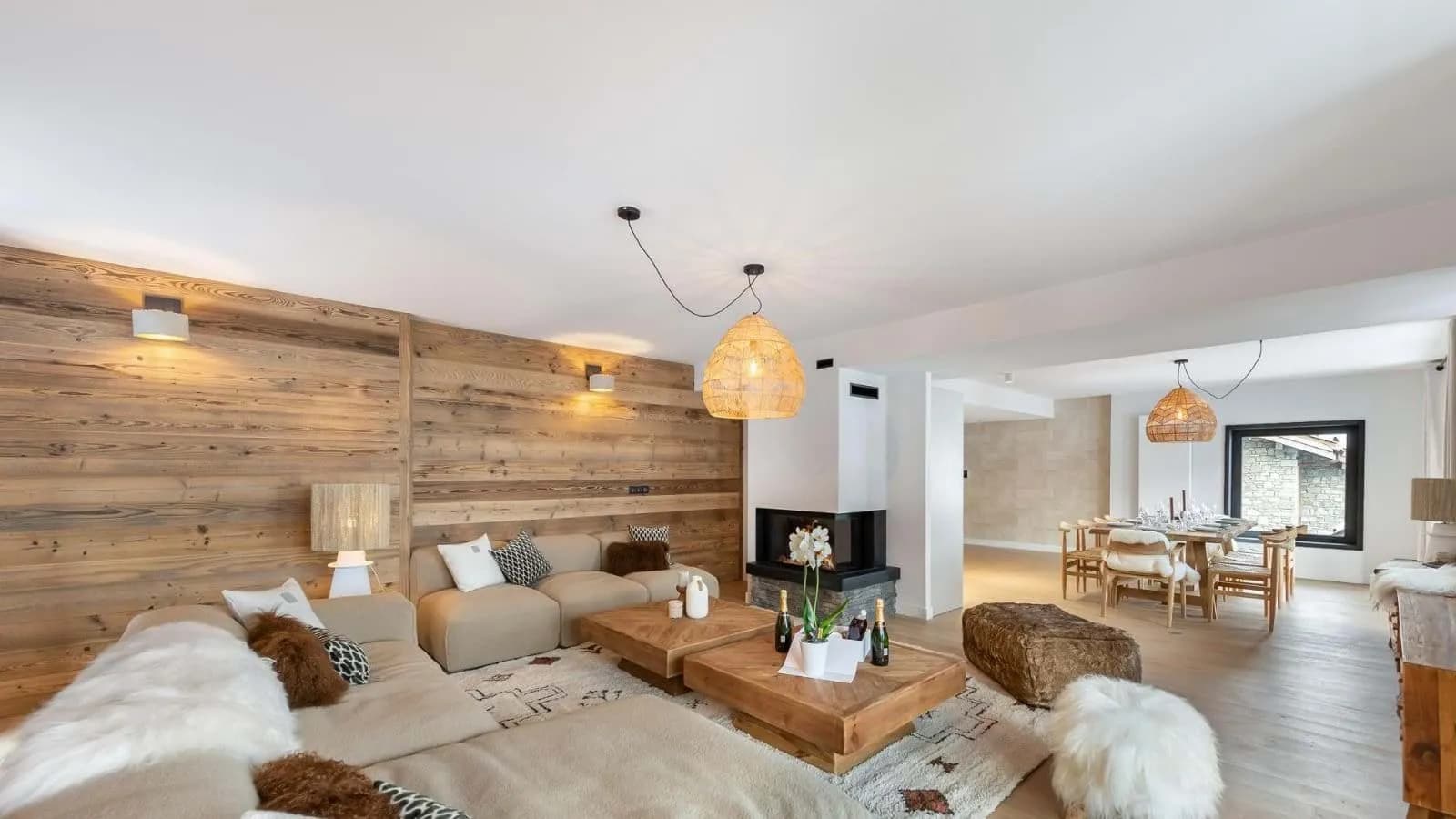 Fireside living area with lounge seating and pendant lights
