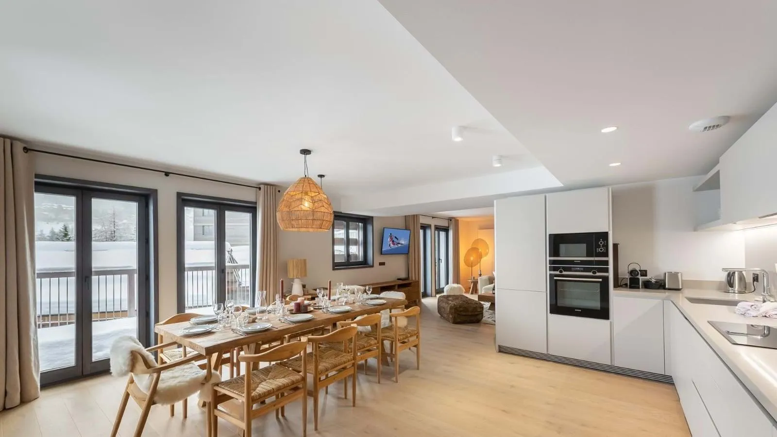Open kitchen and dining area with access to the balcony