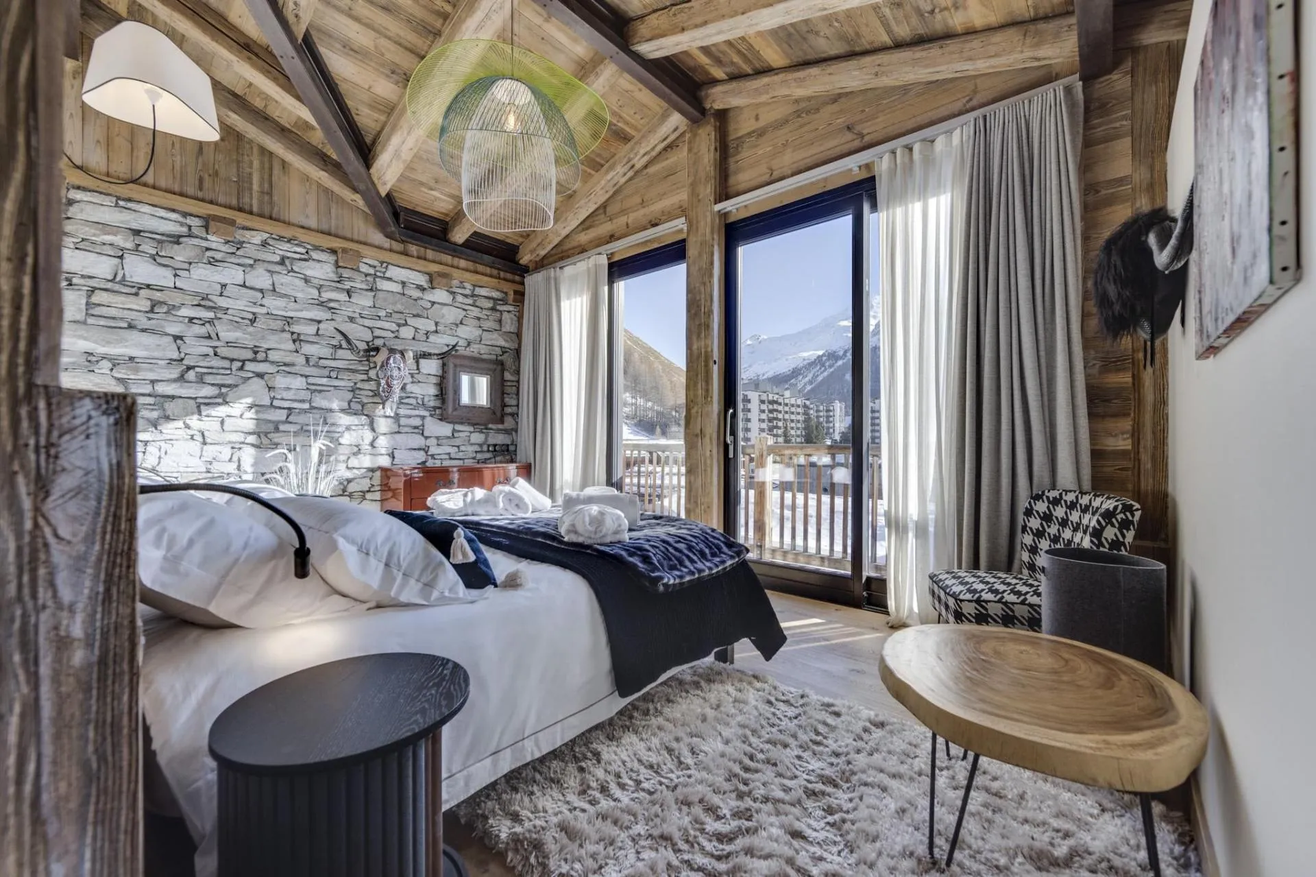 Bedroom with double bed and vaulted timber ceiling
