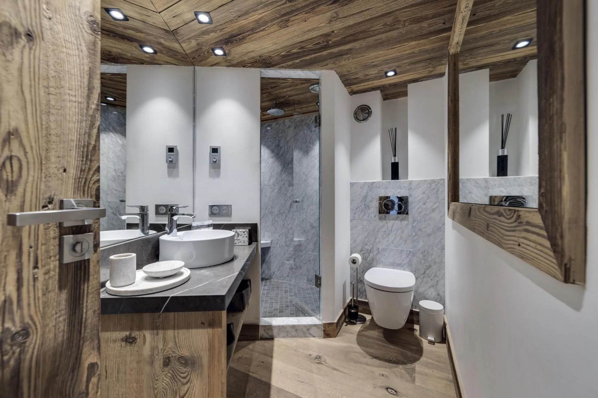 Bathroom with marble walk-in rain shower and reclaimed wood ceiling