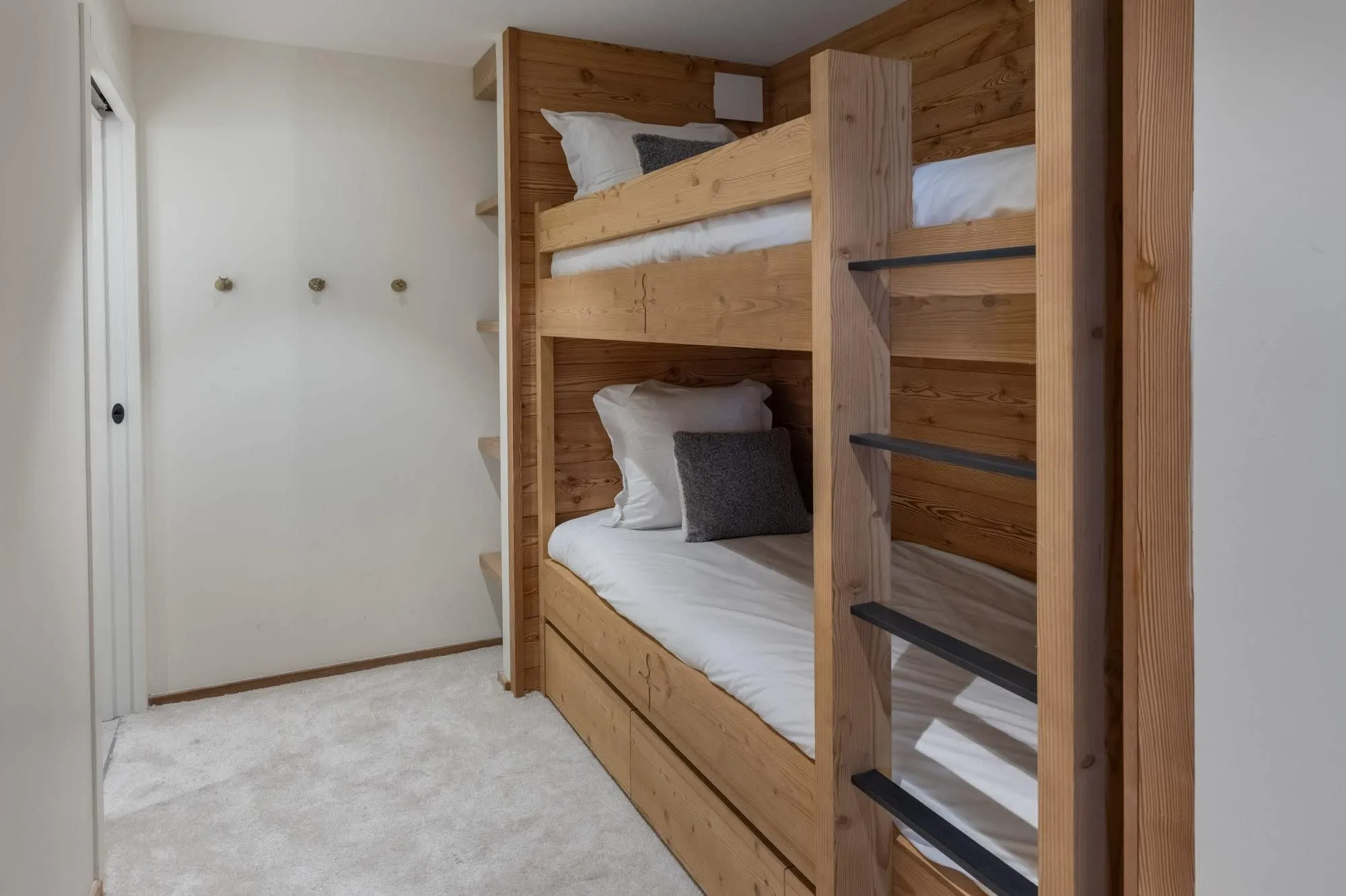 Bunk cabin with two built-in beds and under-bed storage