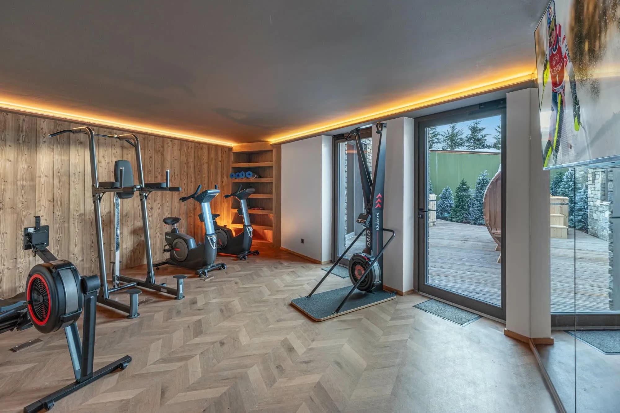 Fitness room with rowing machine and exercise bikes