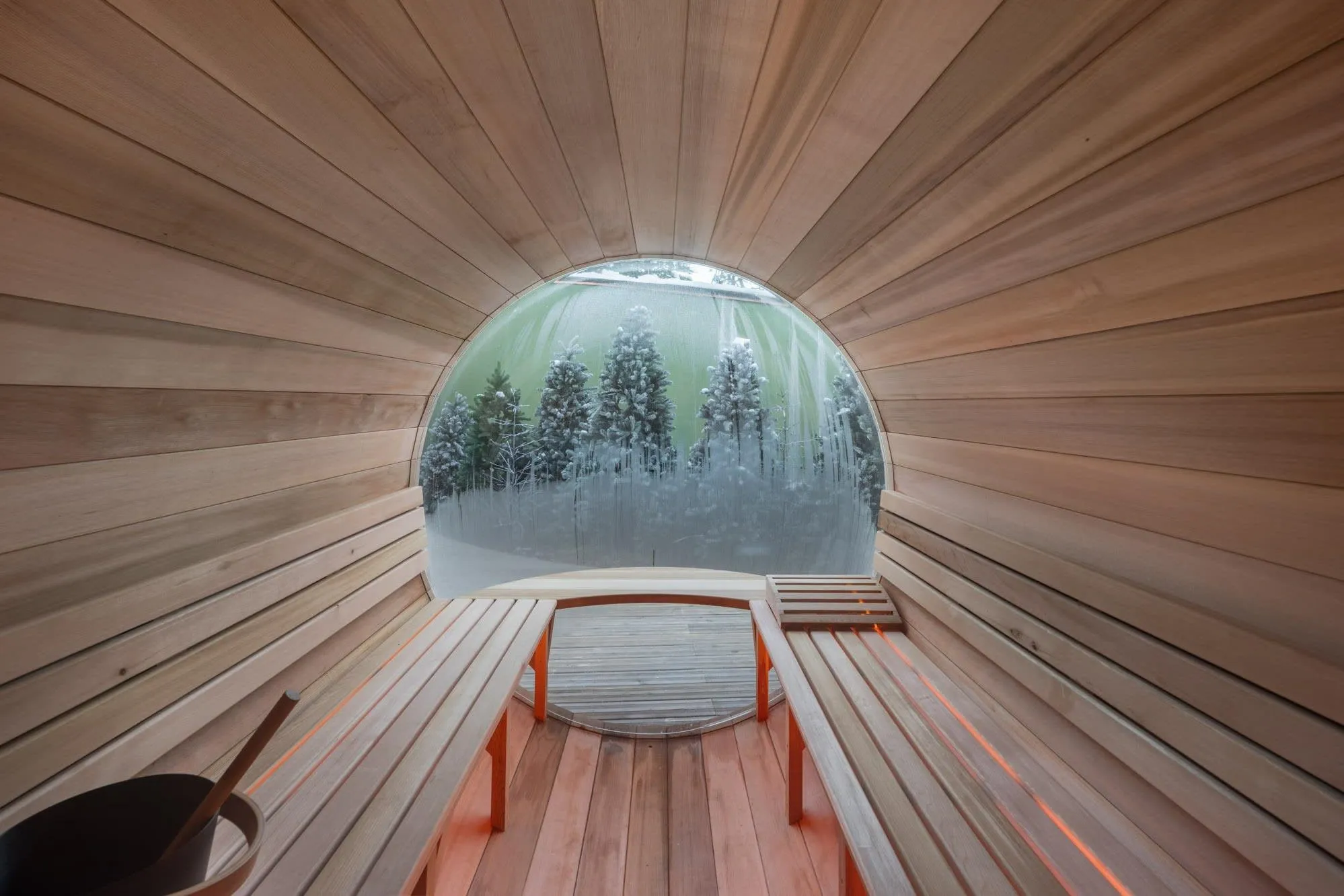 Outdoor Norwegian sauna with a circular window