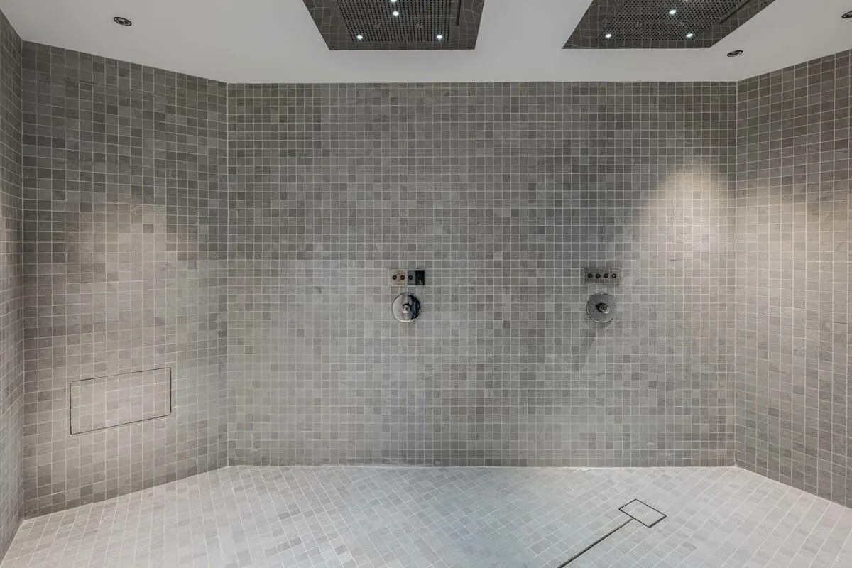 Sensory shower with twin overhead showerheads