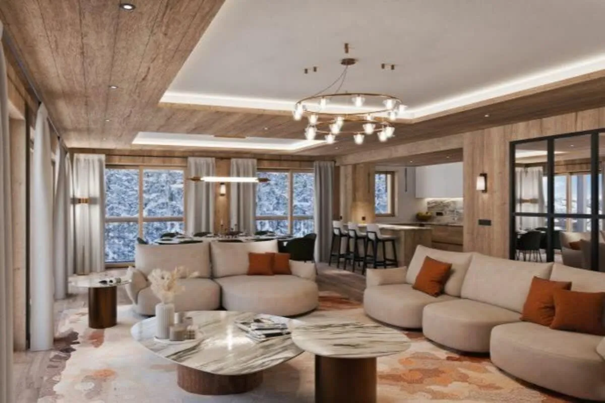 Open-plan lounge with kitchen and dining area beyond