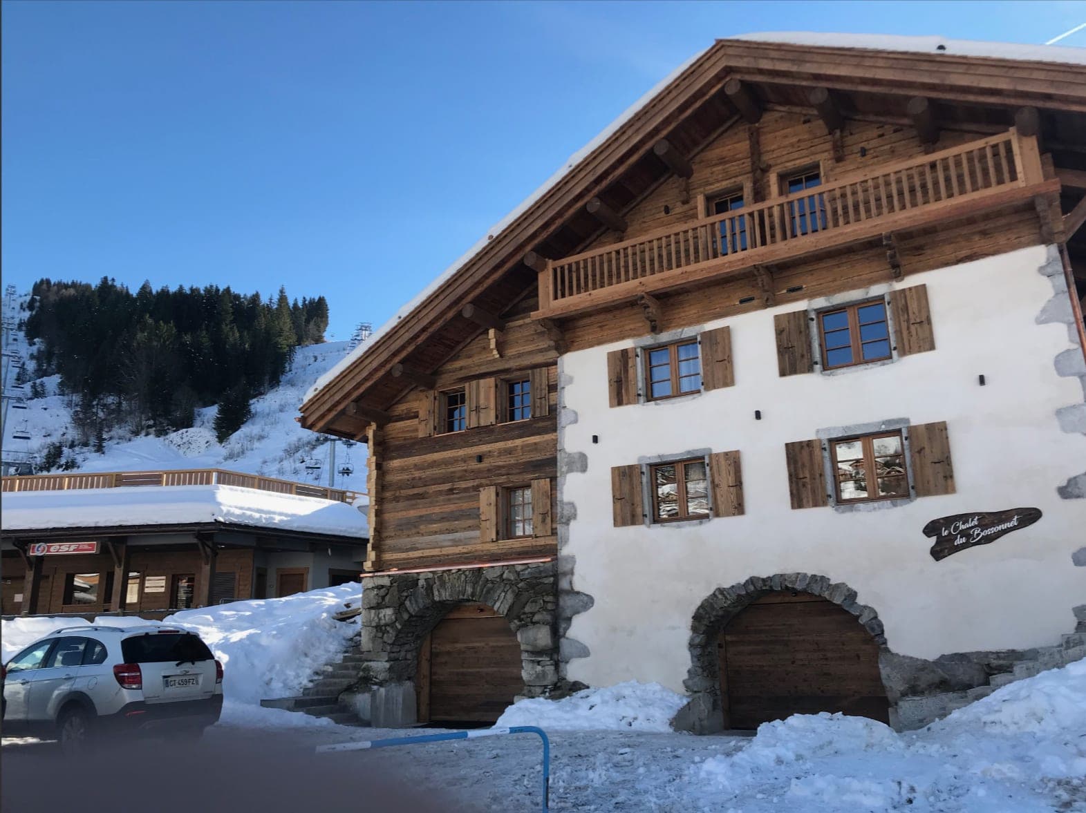 Ski-in/ski-out chalet exterior located steps from the ESF ski school