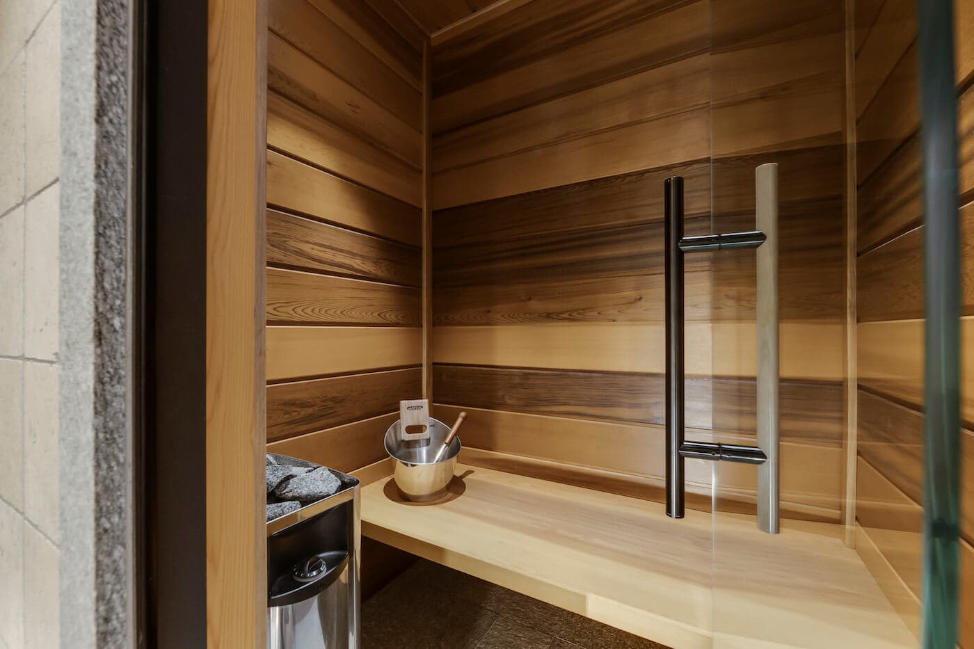 Cedar sauna with glass door and electric heater