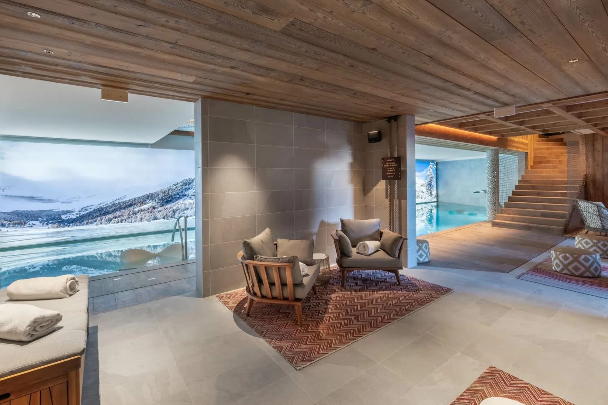 Shared wellness lounge beside the indoor pool