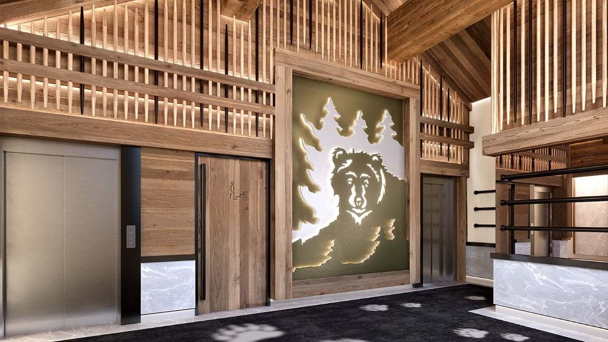 Lobby area with elevator access and public restroom