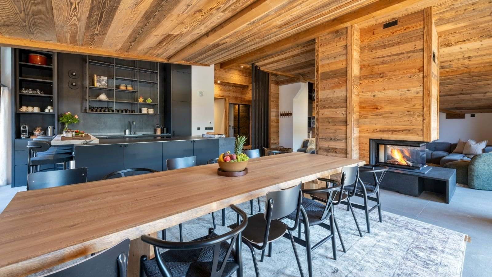 Dining area seats 10; double-sided fireplace connects to living room