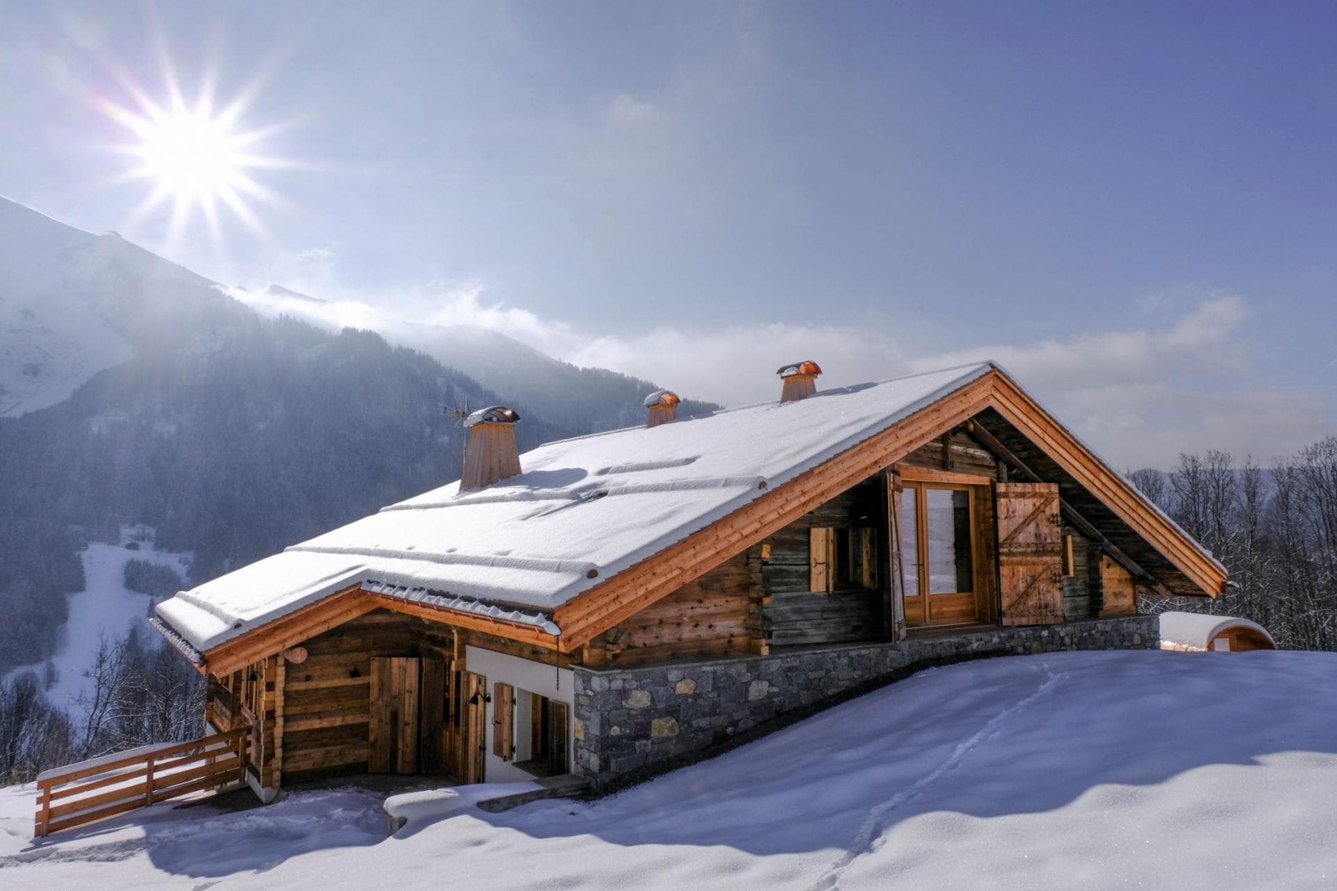 Ski-in chalet exterior with direct access to local slopes