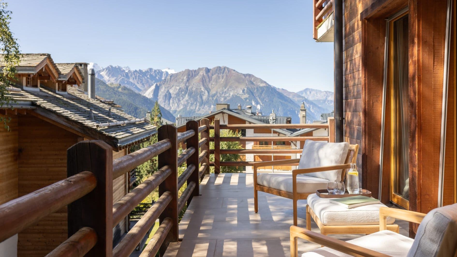 Balcony with lounge seating and panoramic mountain views