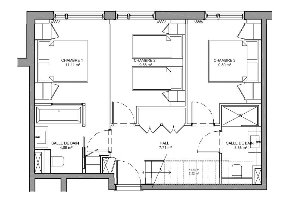 Floor plan: three bedrooms, two bathrooms, and central hallway