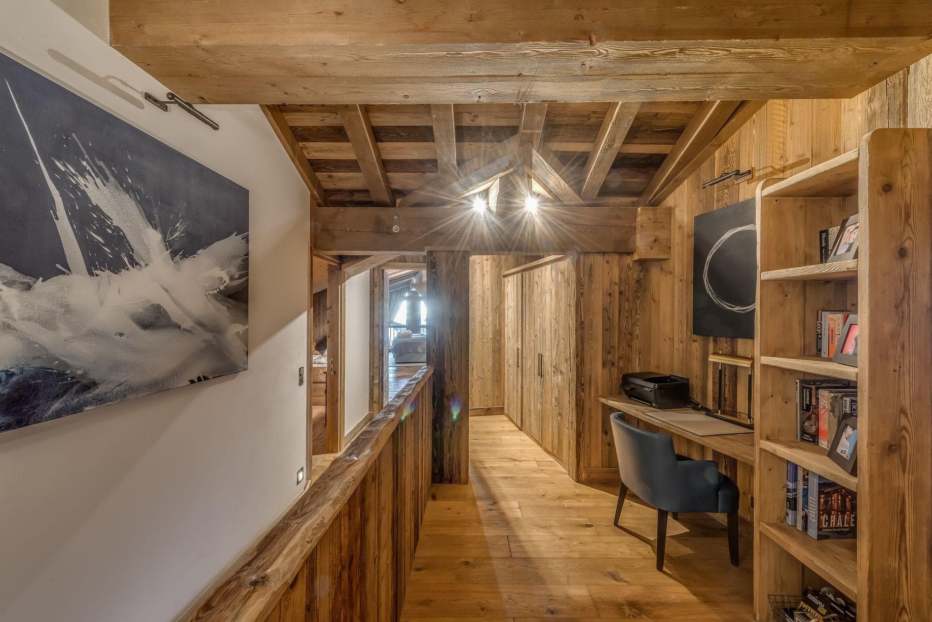 Landing workspace with built-in desk, printer, and integrated closet storage