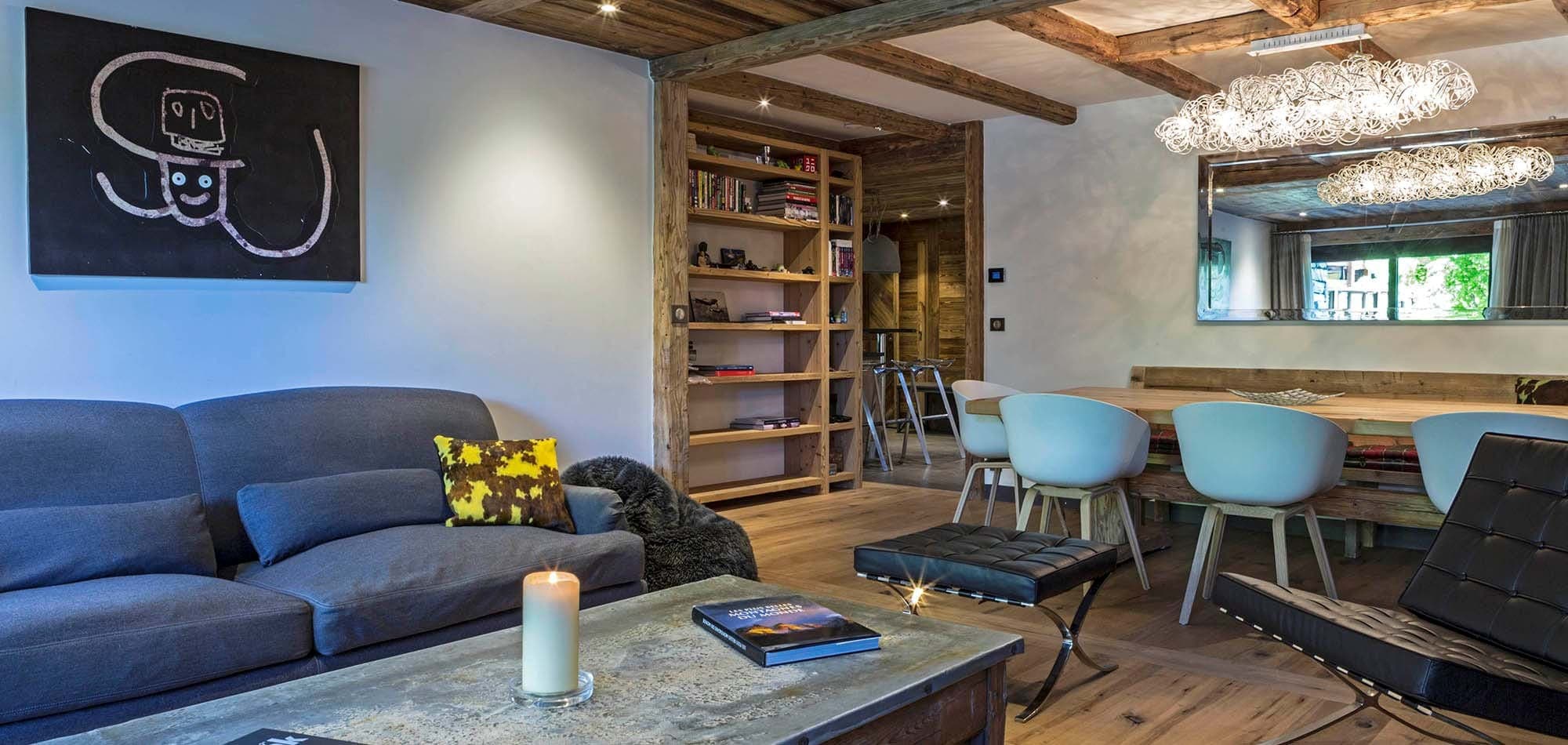 Open-plan living and dining area with farmhouse table seating 10