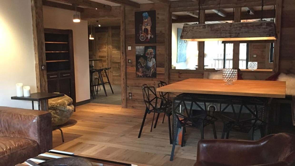 Dining area with seating for 6 and reclaimed wood accents