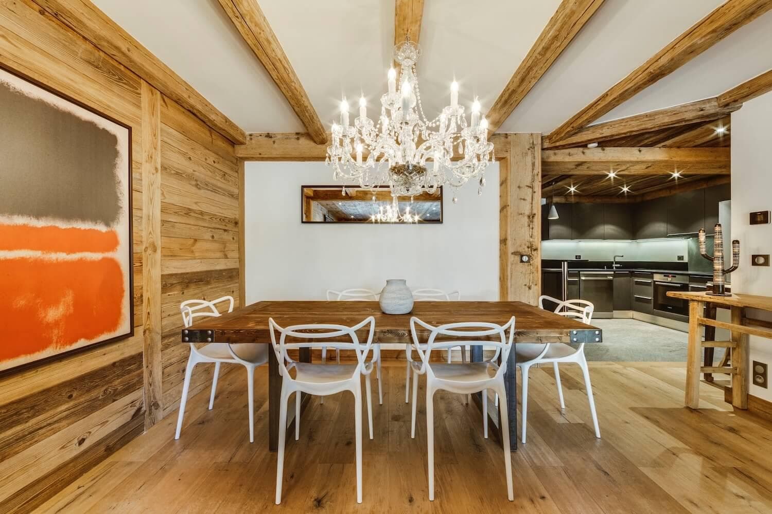 Dining area with seating for 6 and reclaimed wood beam ceilings