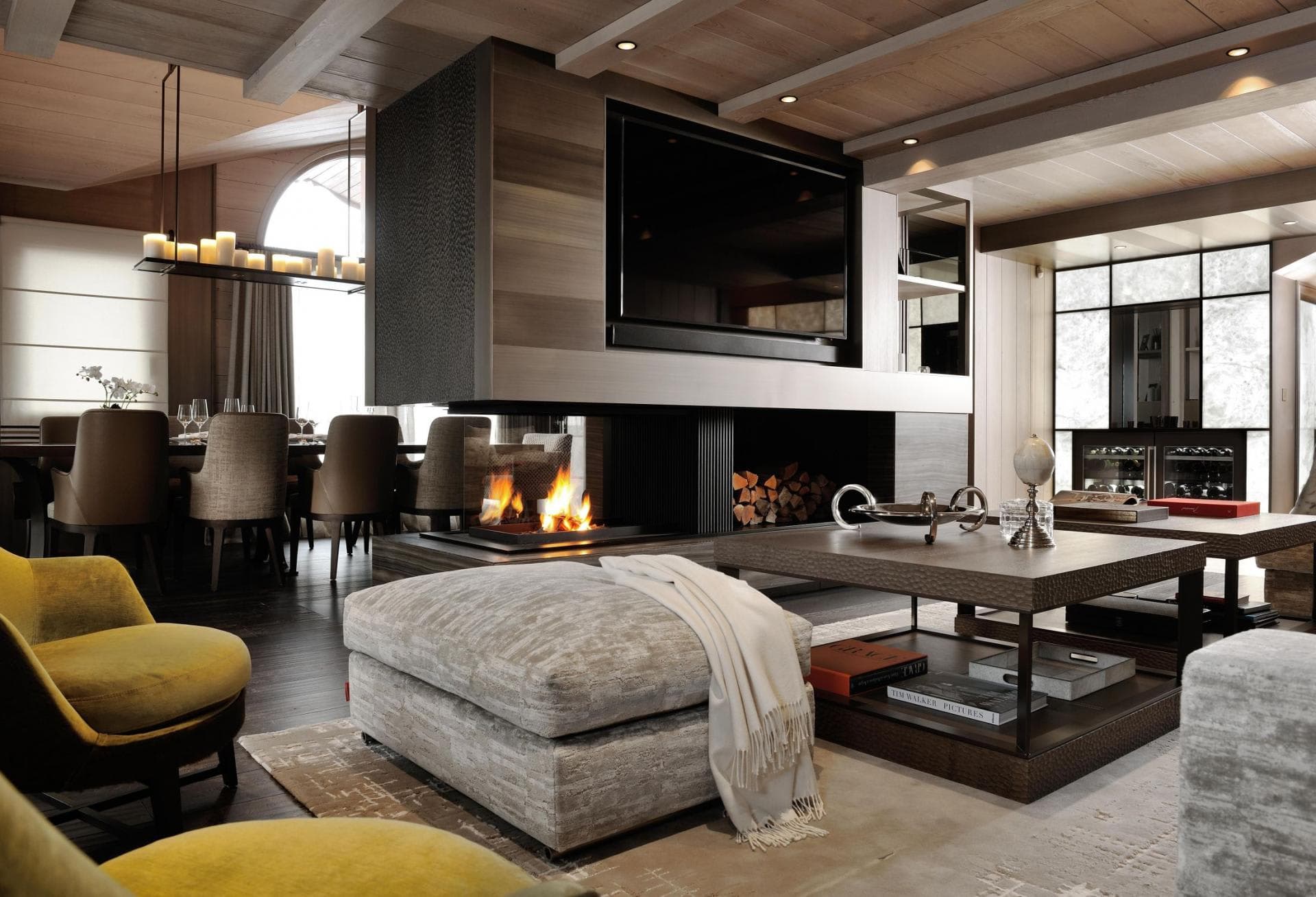 Open living area with double-sided gas fireplace and wine fridge