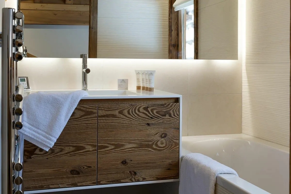 Bathroom with heated towel rail and soaking tub