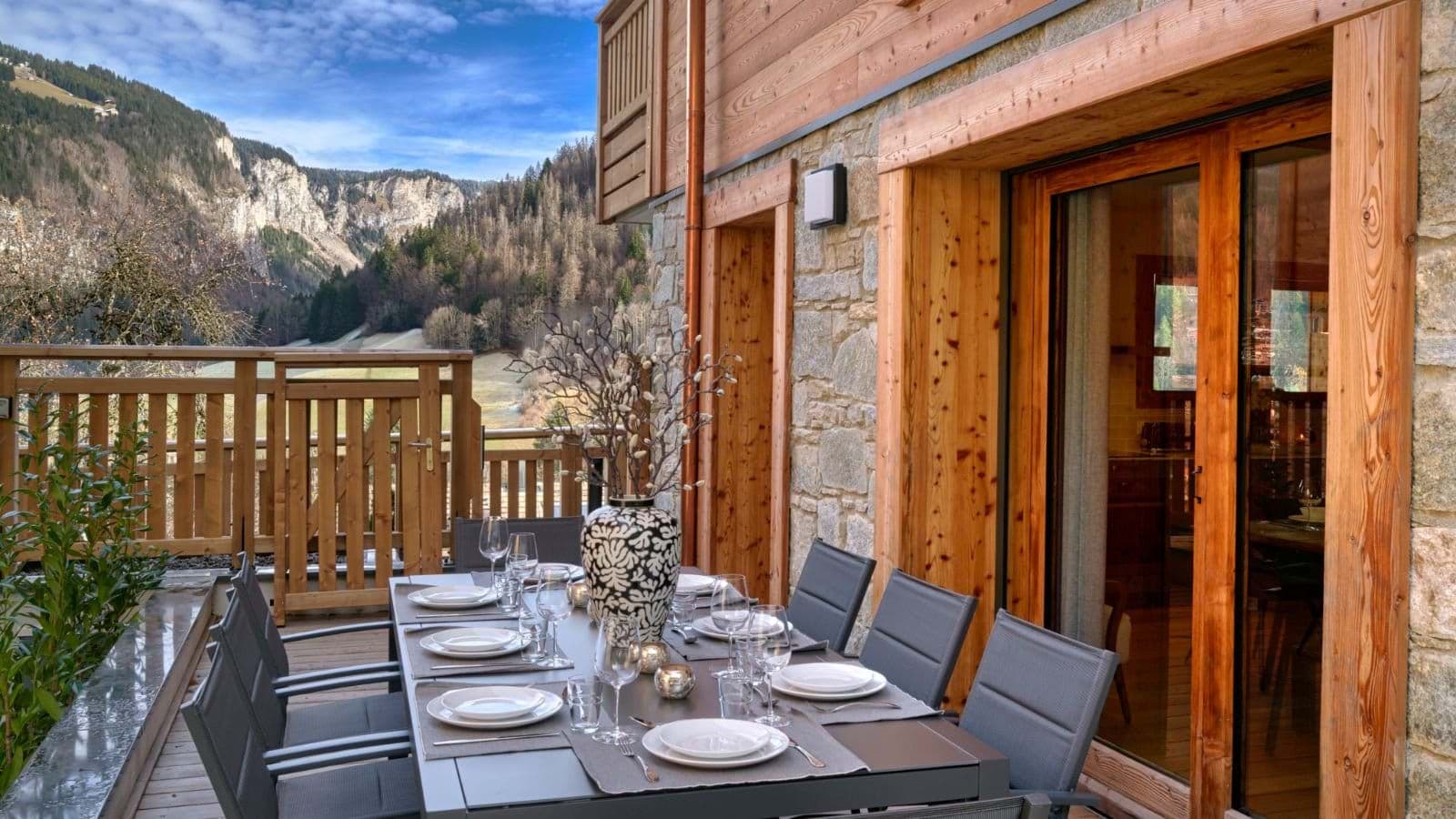 Outdoor dining terrace seats 8 with valley and mountain views
