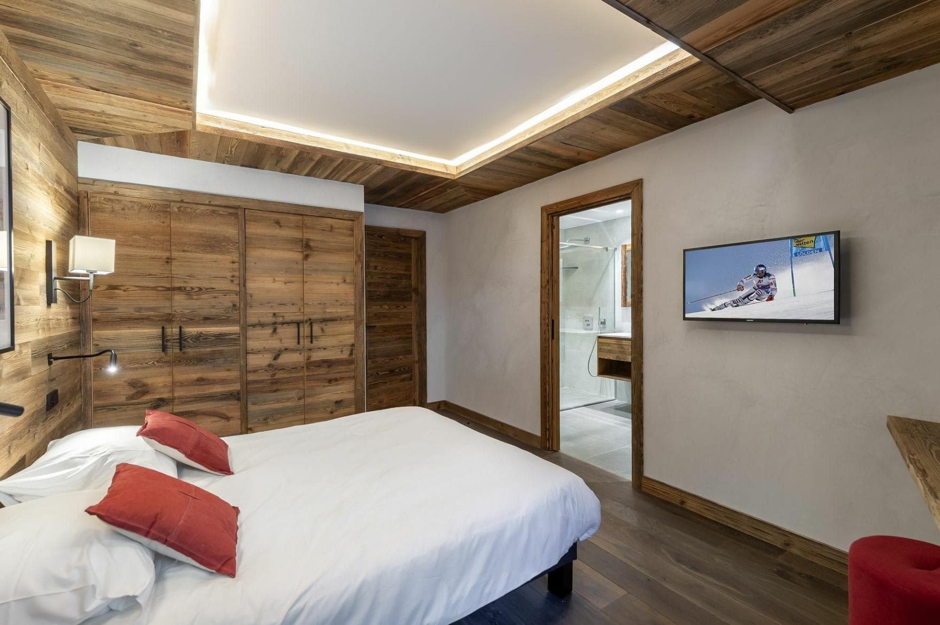 Bedroom with built-in wooden wardrobes and ensuite bathroom
