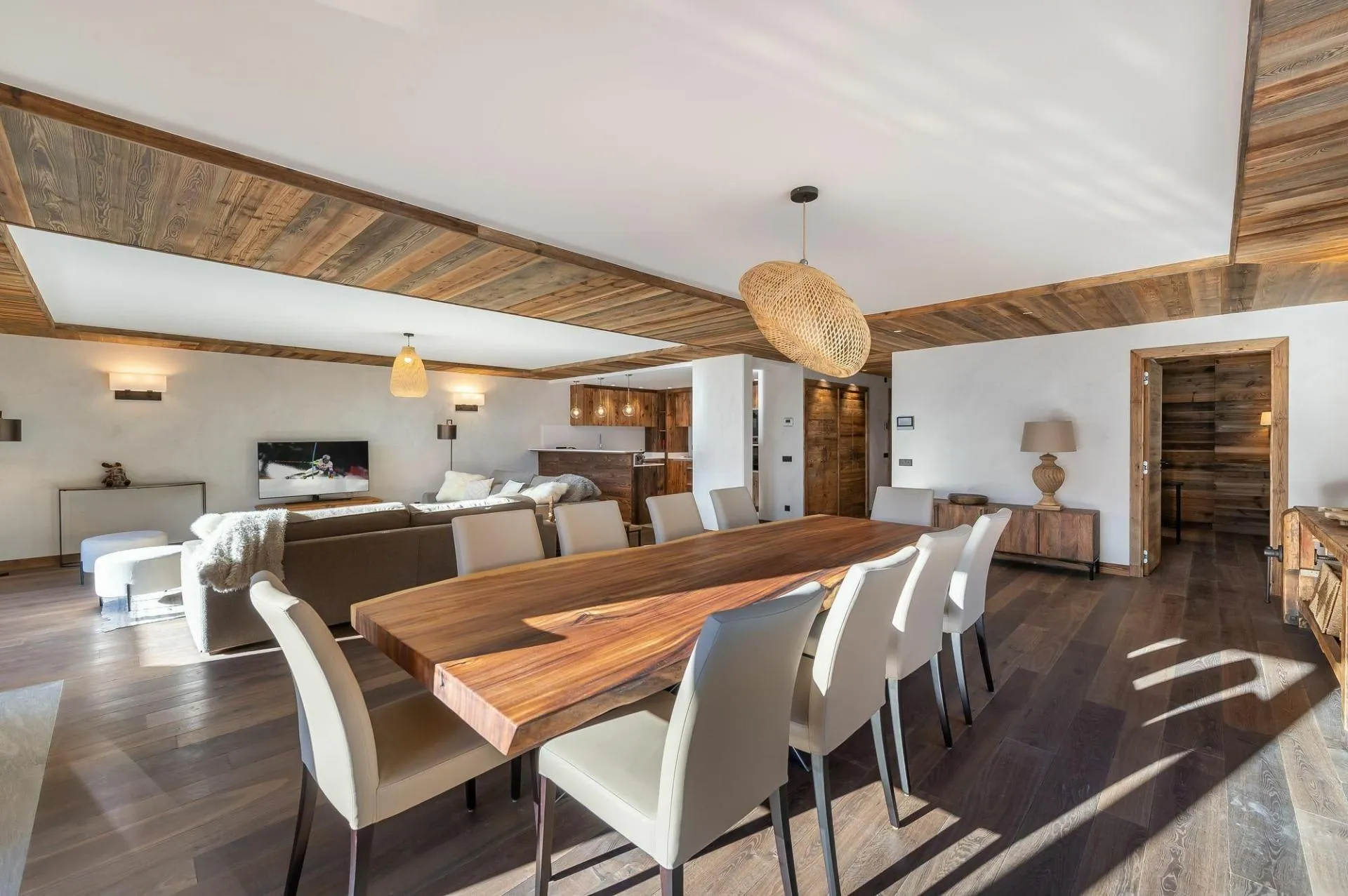 Dining area and lounge with the open kitchen beyond