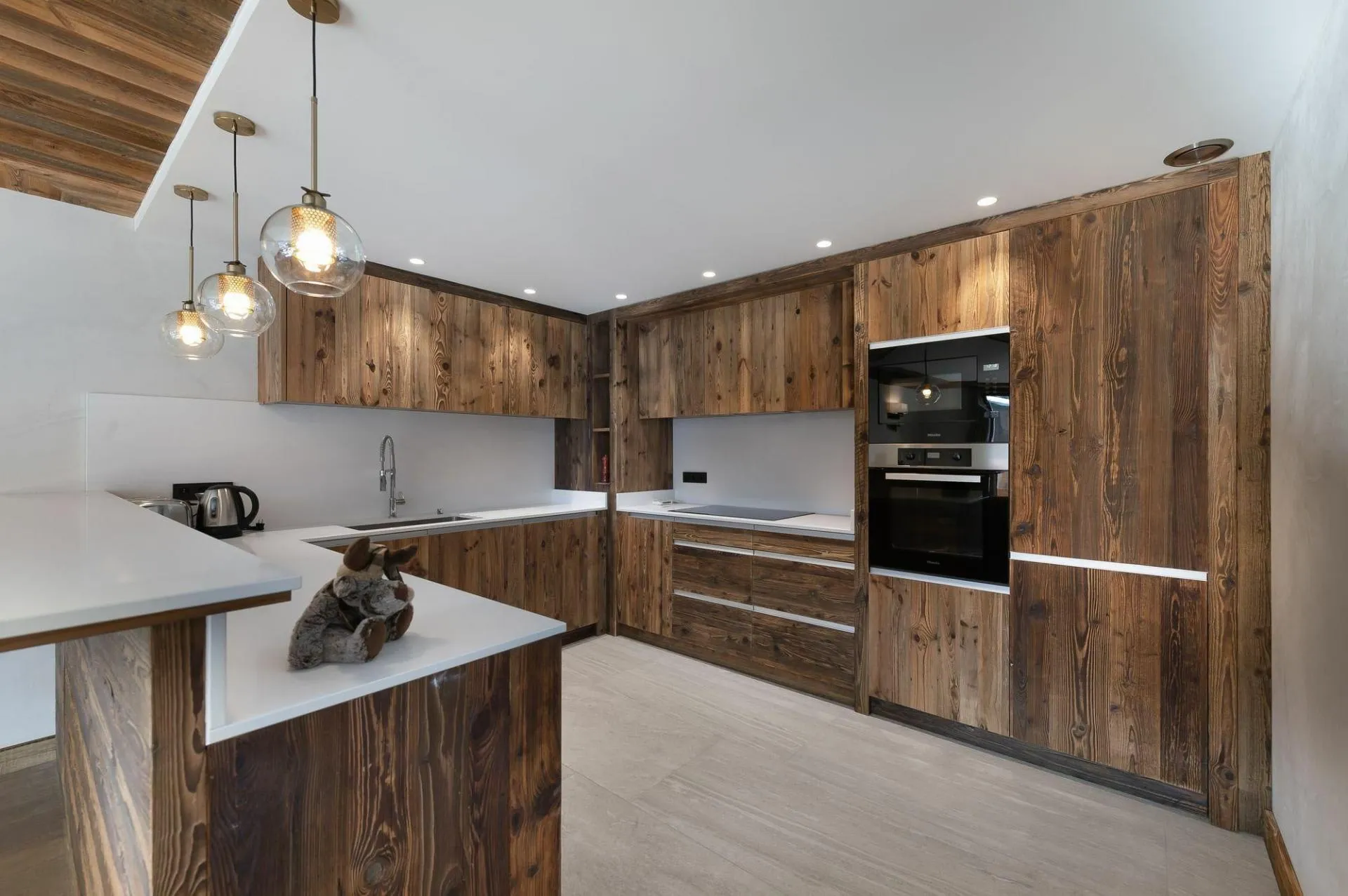 Open kitchen with timber cabinetry and a central island