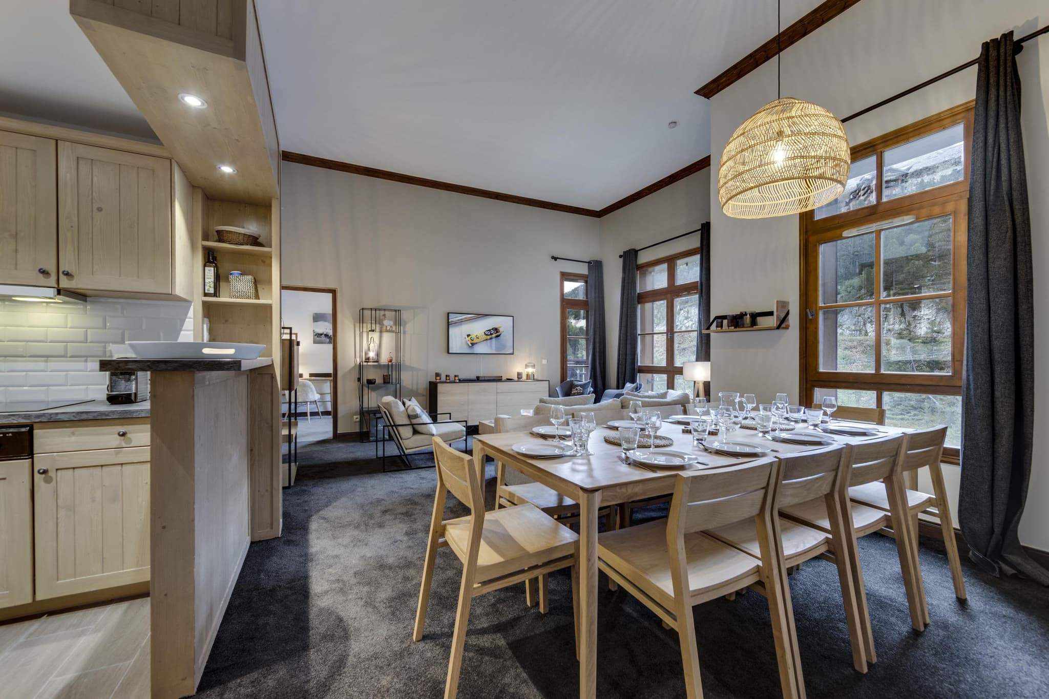 Dining table seats 6; mountain views through large windows