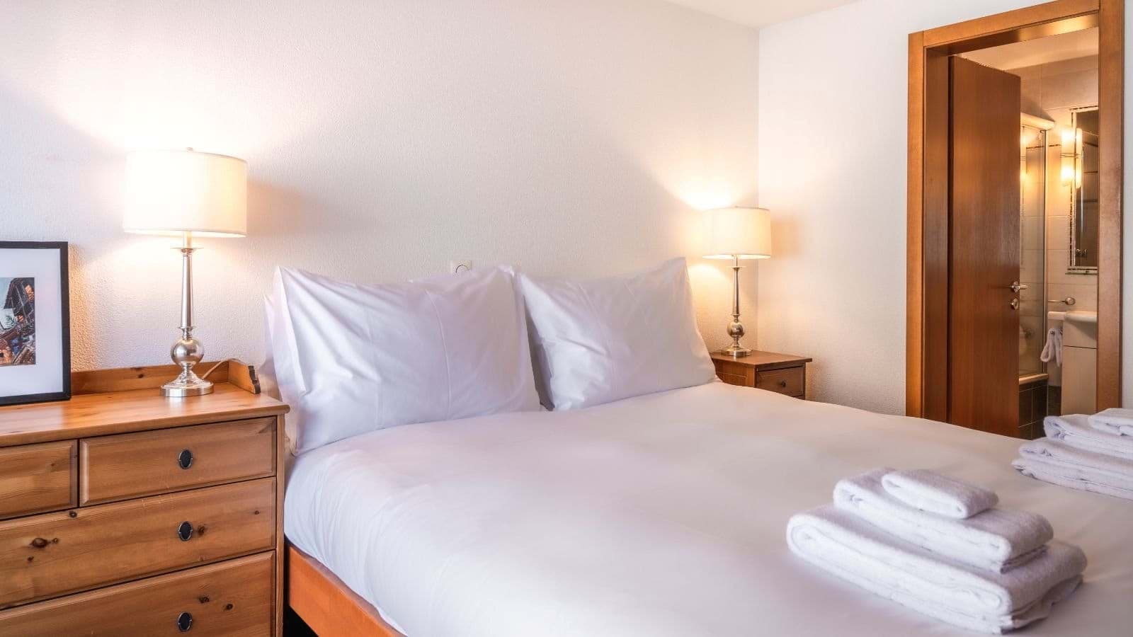 Bedroom with king bed and private ensuite bathroom