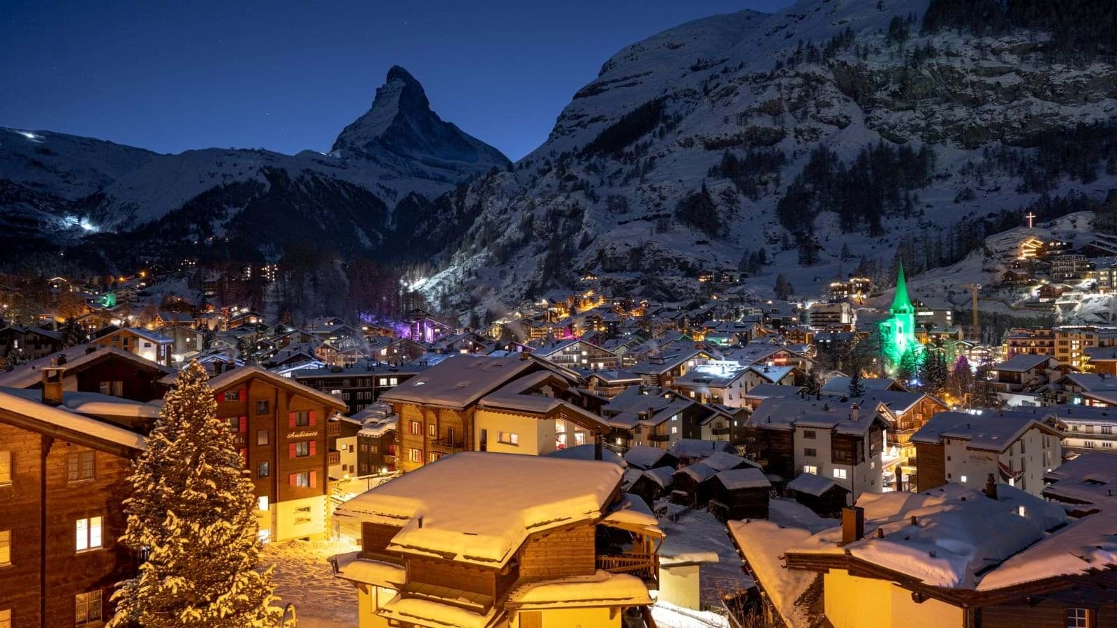 Zermatt village view at night with Matterhorn peak in background