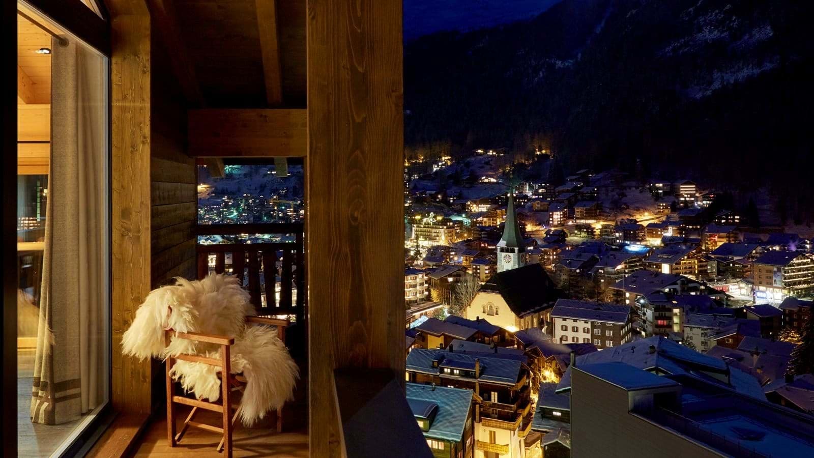 Private balcony with village views and Zermatt church spire
